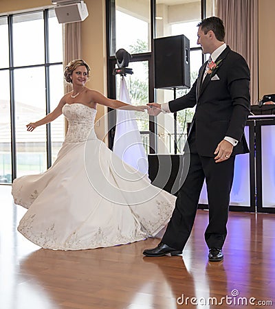 Bride and Groom dancing Stock Photo