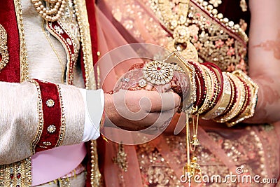 Bride & Groom Hand`s Together in Indian Wedding Stock Photo