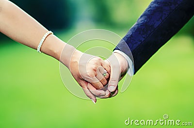 Bride and groom hands Stock Photo