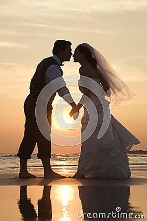 Bride and groom kissing Stock Photo