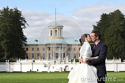 Bride and groom kissing in Arkhangelskoe Stock Photo