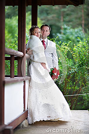 Bride and groom near house of japan style Stock Photo