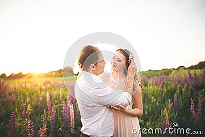 https://thumbs.dreamstime.com/x/bride-groom-rissing-sunset-beautiful-field-flowers-romantic-married-couple-74278902.jpg