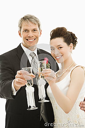 Bride and groom toasting. Stock Photo