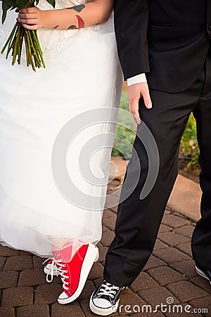 Bride and Groom Wear Converse Editorial Stock Photo