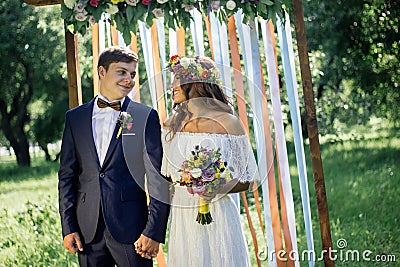 Bride and groom during wedding ceremony outdoor Stock Photo