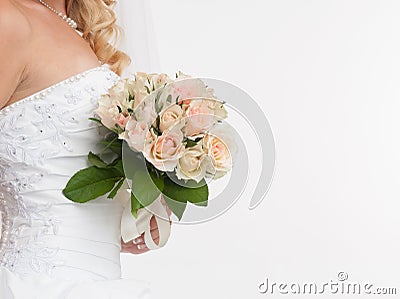 Bride hands holding wedding bouquet Stock Photo