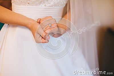 Bride hands wedding ring Stock Photo