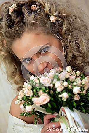 Bride holding a beautiful bouquet Stock Photo