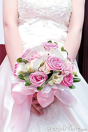 Bride holding bouquet Stock Photo