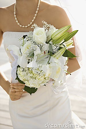 Bride holding bouquet. Stock Photo