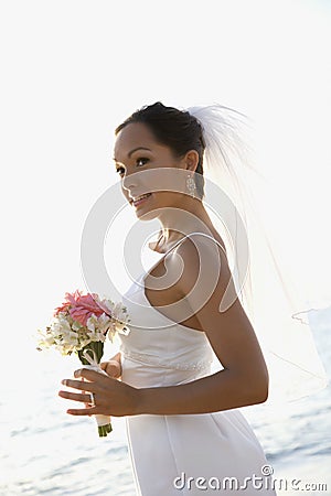 Bride holding bouquet Stock Photo