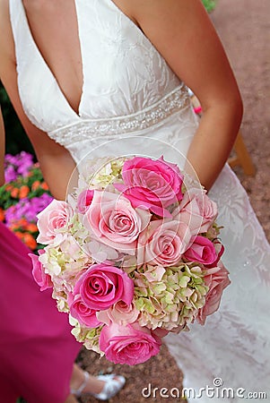 Bride holding bouquet Stock Photo