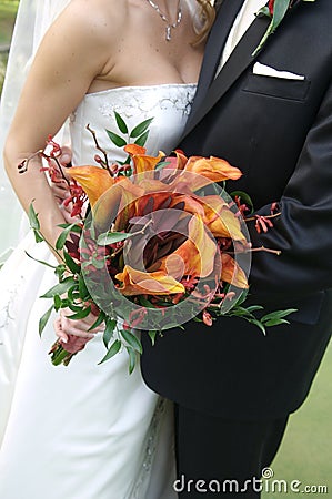 Bride holding her bridal bouquet Stock Photo