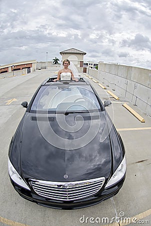 Bride in Limousine sunroof Stock Photo