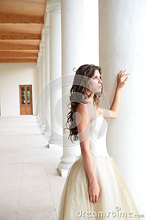 Bride near pillars Stock Photo