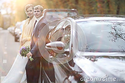 Bride near wedding car Stock Photo