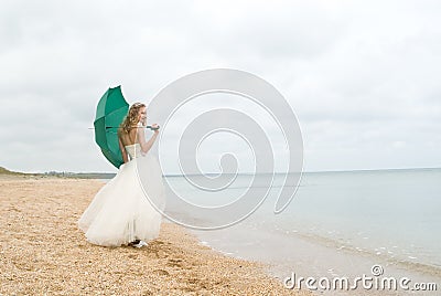 The bride with a parasol Stock Photo