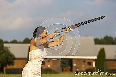 Bride with Shotgun Stock Photo