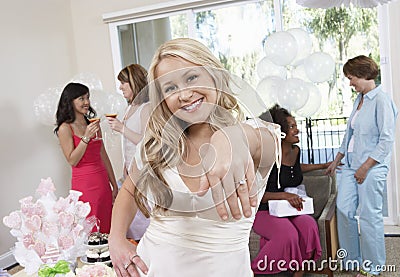 Bride Showing Her Engagement Ring At Hen Party Stock Photo