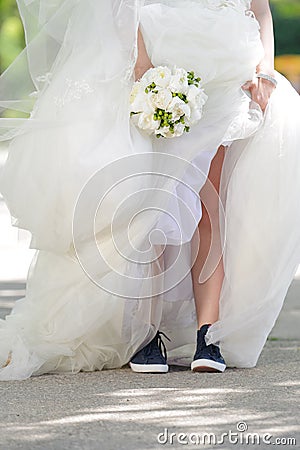 Bride in Sneakers Stock Photo