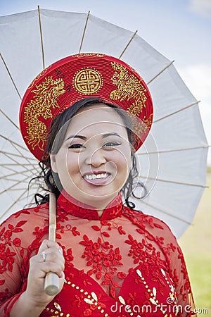 Bride wearing Vietnamese Ao Dai Stock Photo