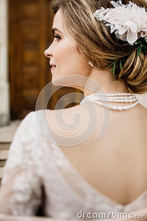Bride with wedding makeup and hairstyle. Smiling bride. Wedding Stock Photo