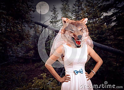 Bride with wolf head in the night wood Stock Photo