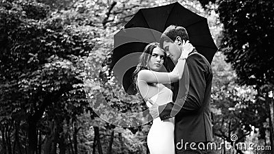 Brides couple gently kissing Stock Photo