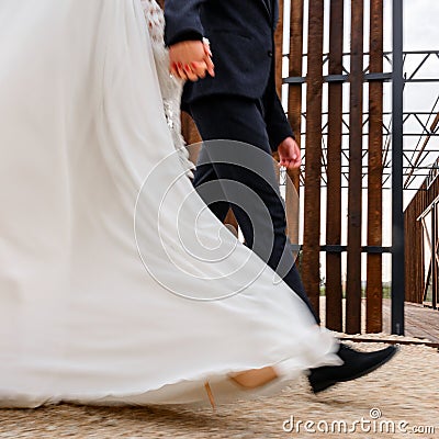 Brides walk on their wedding day, couple walk on their festive and touching day Stock Photo