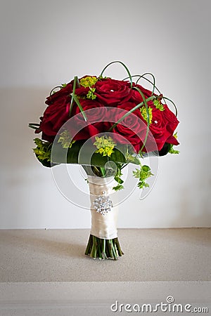 Brides Wedding Bouquet of Red Roses Stock Photo