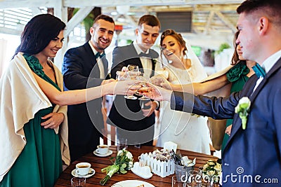 Brides wedding day with friends in a cafe Stock Photo