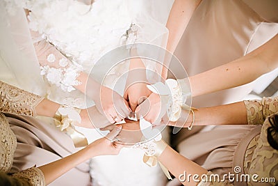 Bridesmaids bridesmaids from flowers on their hands Stock Photo