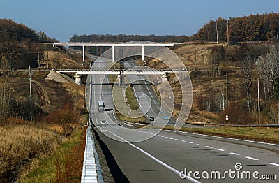 Bridge above the highway, fall landscape Stock Photo
