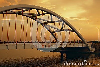 bridge above the river in sunset light Stock Photo