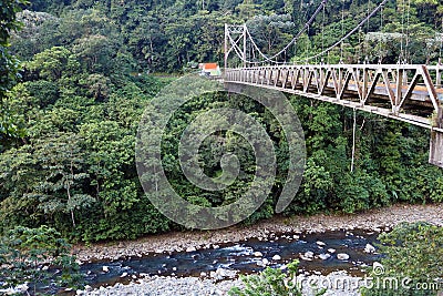 Bridge for cars over a river in Costa Rica jungle Stock Photo