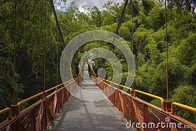 Suspension bridge, walkway to the adventurous, cross to the other side Stock Photo