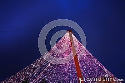 Bridge decorated with Christmas lights Stock Photo