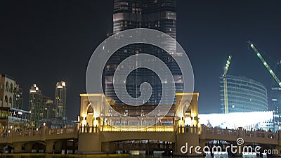 Bridge and fountains in front of Burj Khalifa, Dubai, Emirates timelapse Editorial Stock Photo