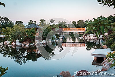 The bridge in the Japanese gardens at sunset in Grand Rapids Michigan Stock Photo