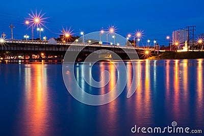 The bridge lights reflecting pool. phitsanulok Stock Photo