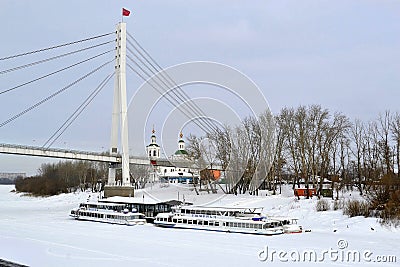 The bridge of lovers through the Tura River and the embankment i Editorial Stock Photo