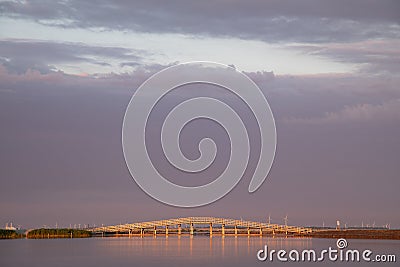 Bridge on the Markerwadden at sunset.The Marker Wadden,artificial archipelago in development located in the Markermeer Stock Photo