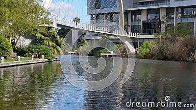 Bridge over canal between offices Editorial Stock Photo