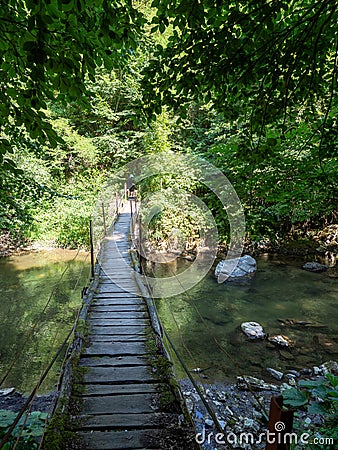 Bridge over Cerna river, Romania trail to Inelet and Scarisoara hamlets, Romania Stock Photo