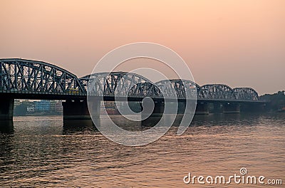 Bridge over Ganga at sunset Stock Photo