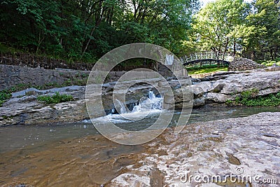 A bridge over a mountain river in Kislovodsk with the name - ladies' whim. Stock Photo