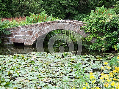 Bridge over pond Stock Photo