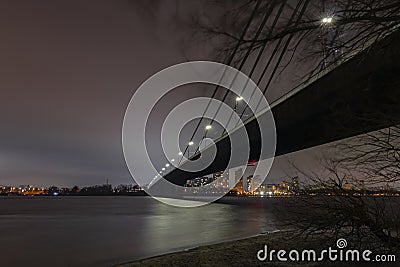 Bridge over the river at night in Kyiv Stock Photo