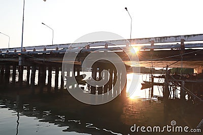 Bridge over the river and sunset Stock Photo